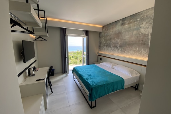 Suite familiar | Sábanas italianas Frette, ropa de cama de alta calidad y edredón