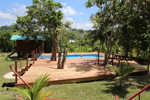 Outdoor pool, pool umbrellas, sun loungers