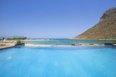 When the pool touches the sea.In front of the beach Antony Quinn danced syrtaki!