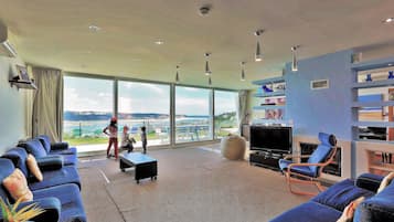 Smart TV, fireplace, DVD player, foosball