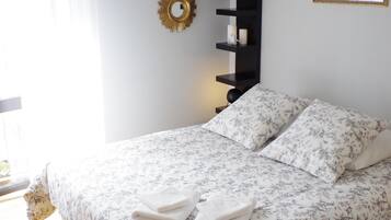 1 habitación, tabla de planchar con plancha, wifi y ropa de cama