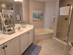 Shower, jetted tub, hair dryer, towels