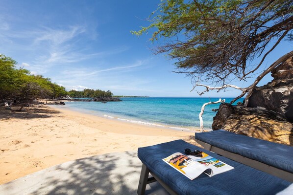 On the beach, sun loungers, beach towels