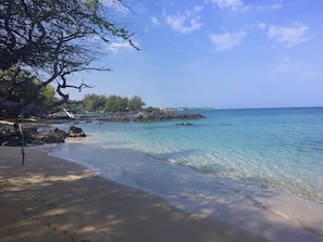 On the beach, sun loungers, beach towels