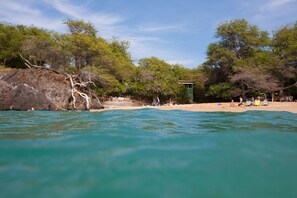 On the beach, sun loungers, beach towels