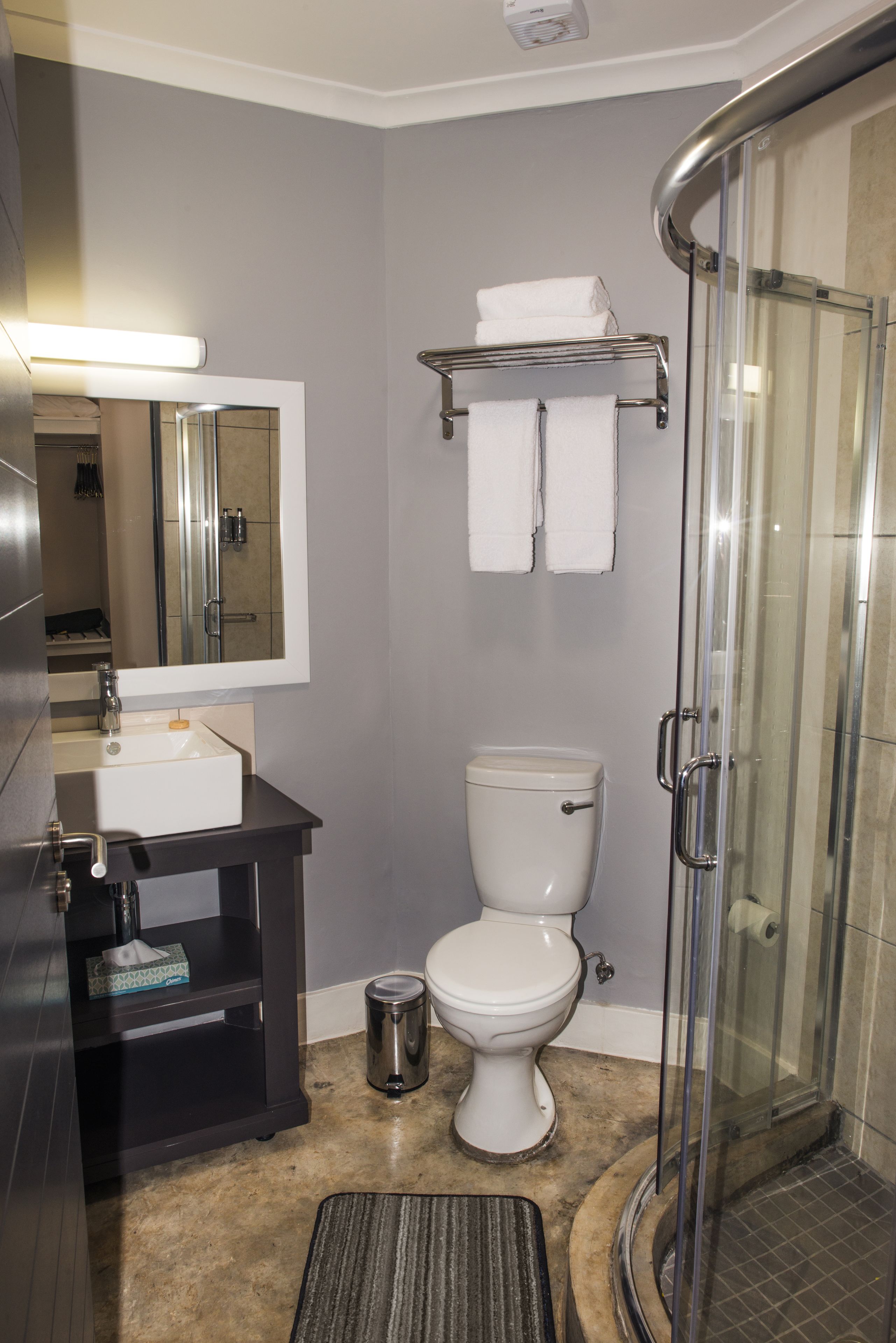 shower, free toiletries, slippers, towels