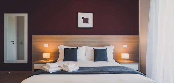 Ropa de cama de alta calidad y minibar 