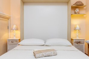 2 habitaciones y tabla de planchar con plancha 