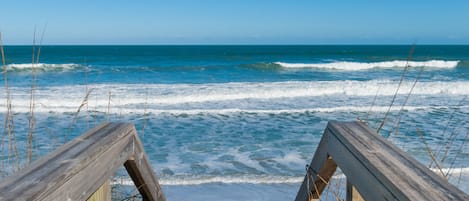 On the beach, sun loungers, beach towels