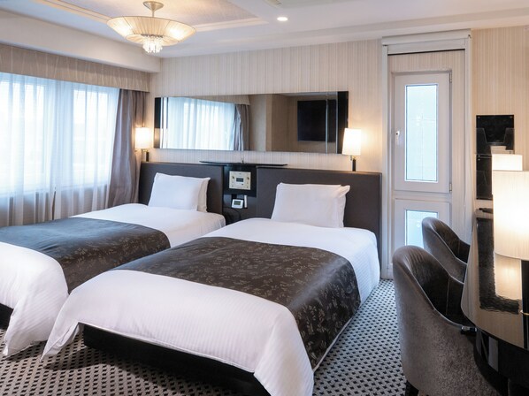 Deluxe Twin kamer, niet-roken | Luxe beddengoed, donsdekens, een bureau, verduisterende gordijnen