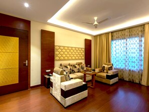 Luxury Suite, 1 Bedroom | Living area | Flat-screen TV - Hotel Kasturi Orchid (Luni)