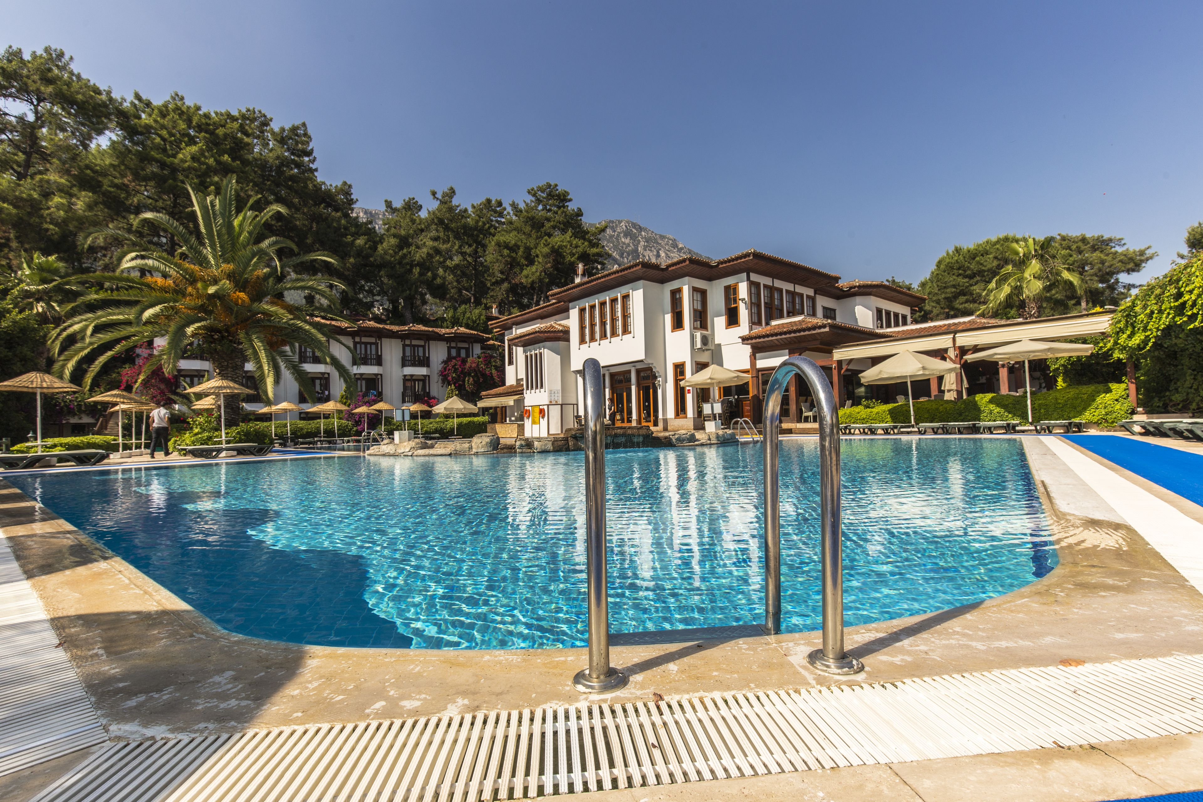 indoor pool, 2 outdoor pools, pool umbrellas, pool loungers