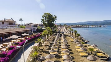 On the beach, free beach cabanas, sun-loungers, beach umbrellas