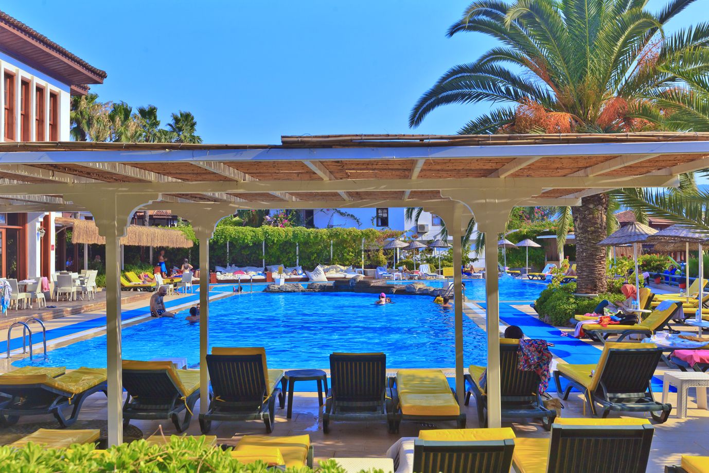 indoor pool, 2 outdoor pools, pool umbrellas, pool loungers