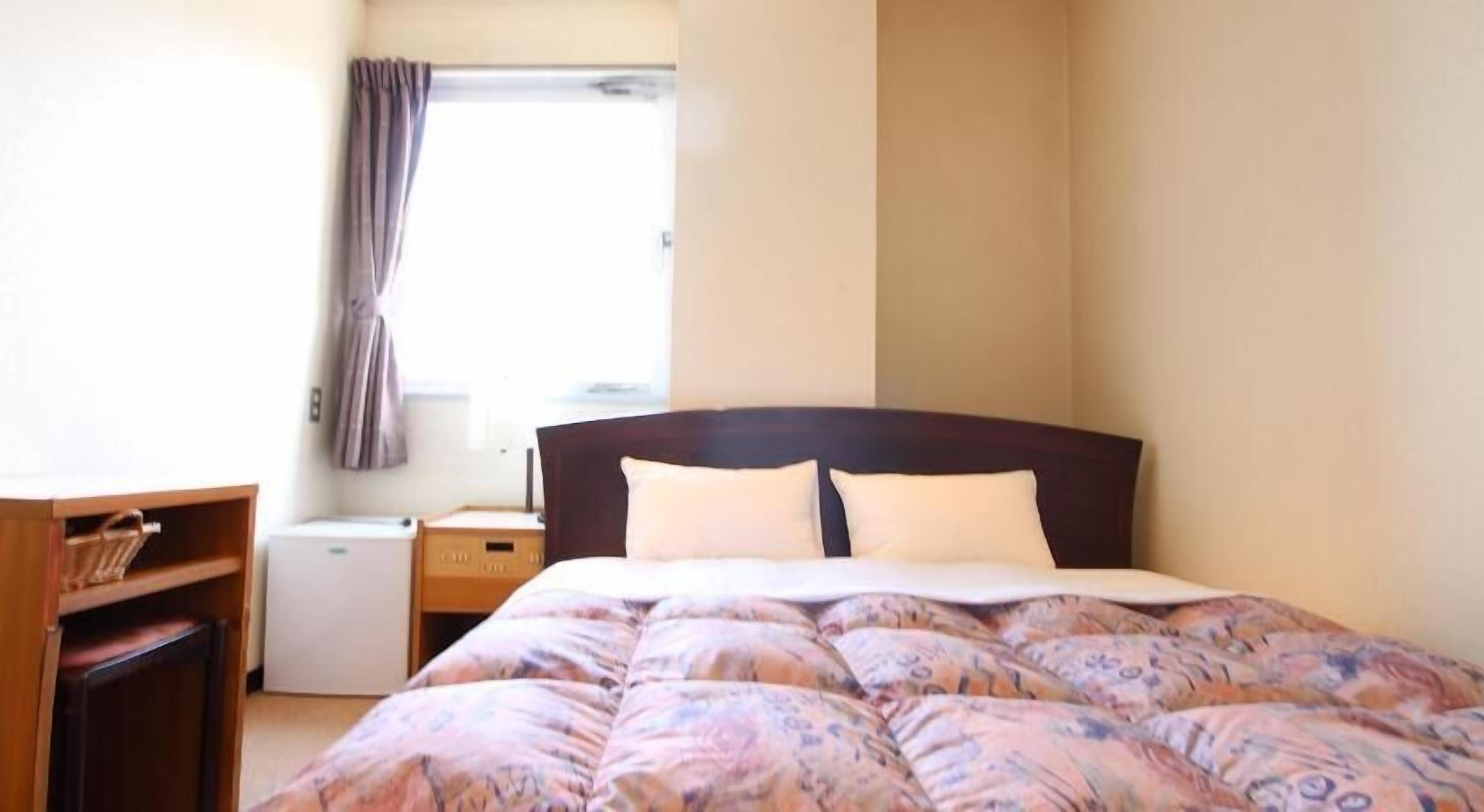 Desk, laptop workspace, blackout curtains, iron/ironing board