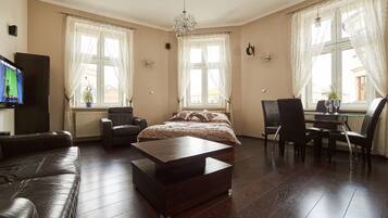 Superior Apartment | Living room | Flat-screen TV