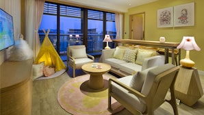 A modern living room with a sofa, chairs, a coffee table, a yellow tent, and a balcony with a view. - Mangrove Tree Resort World - Elader Palm (Sanya)