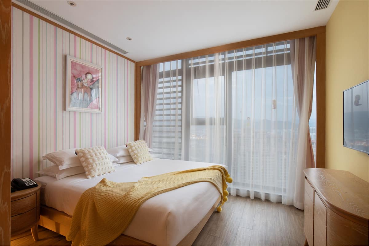 Two-Bedroom Suite (A/B/C) | Minibar, in-room safe, desk, blackout drapes