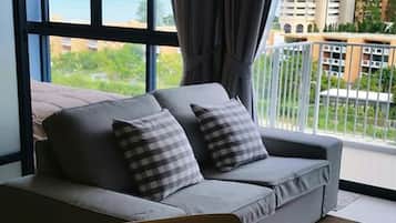 One Bedroom Apartment | Living area | 42-inch LED TV with cable channels, TV