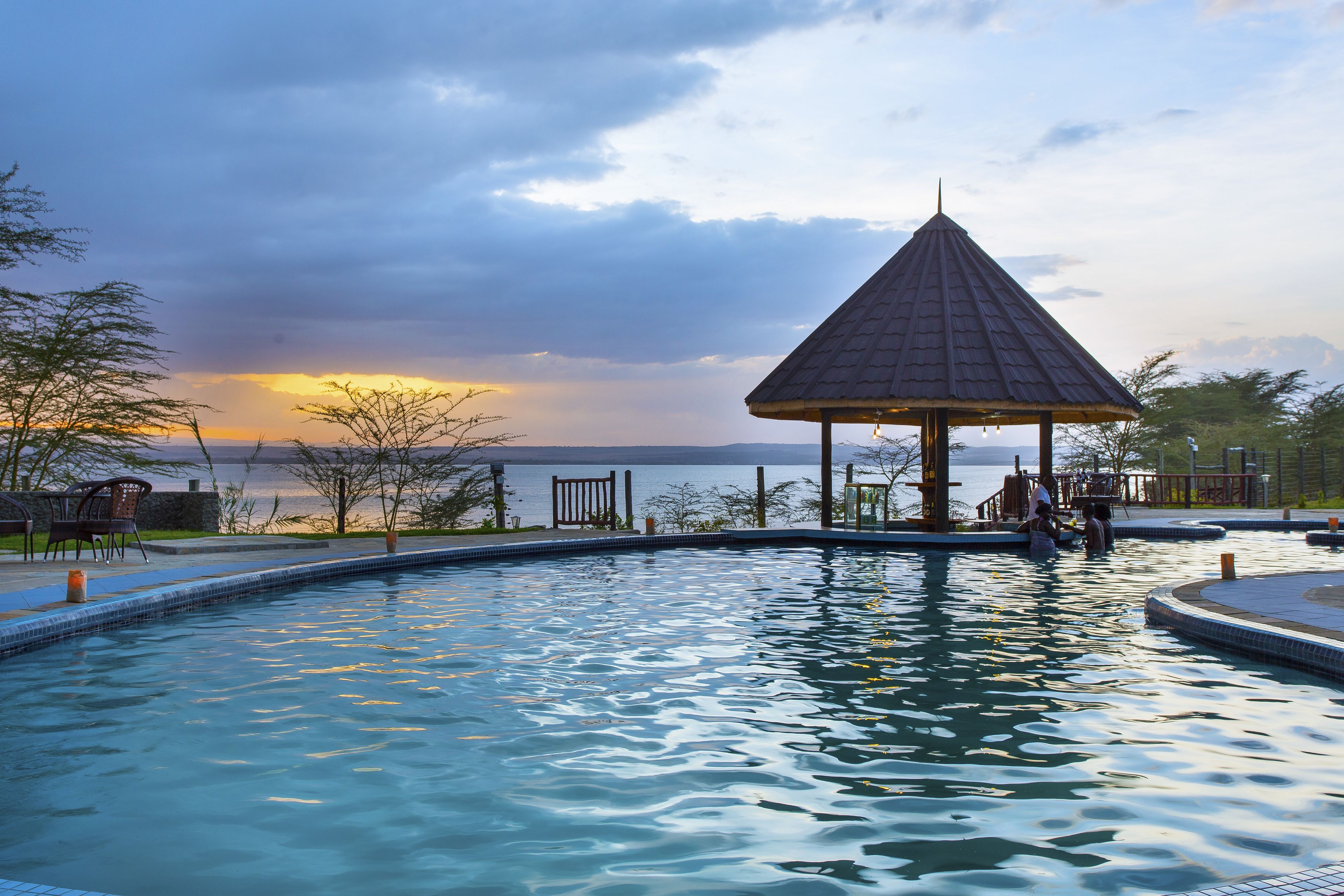 Outdoor pool, pool umbrellas, sun loungers