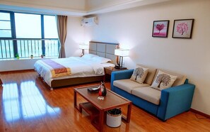 Chambre exécutive double | Aire de séjour | Téléviseur ACL