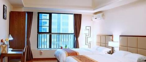 Deluxe Twin Room | Desk, laptop workspace, blackout drapes, free WiFi