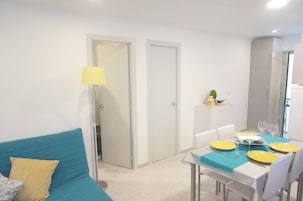 Superior Apartment, 2 Bedrooms | Living area | Flat-screen TV