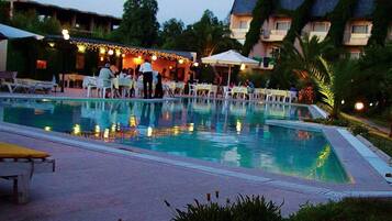 Outdoor pool, pool umbrellas, pool loungers