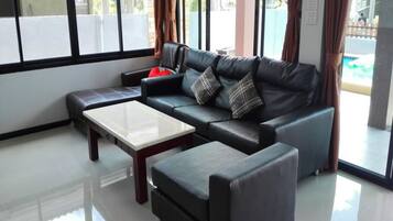 3-Bedroom Pool Villa | Living room | 32-inch flat-screen TV with satellite channels, TV