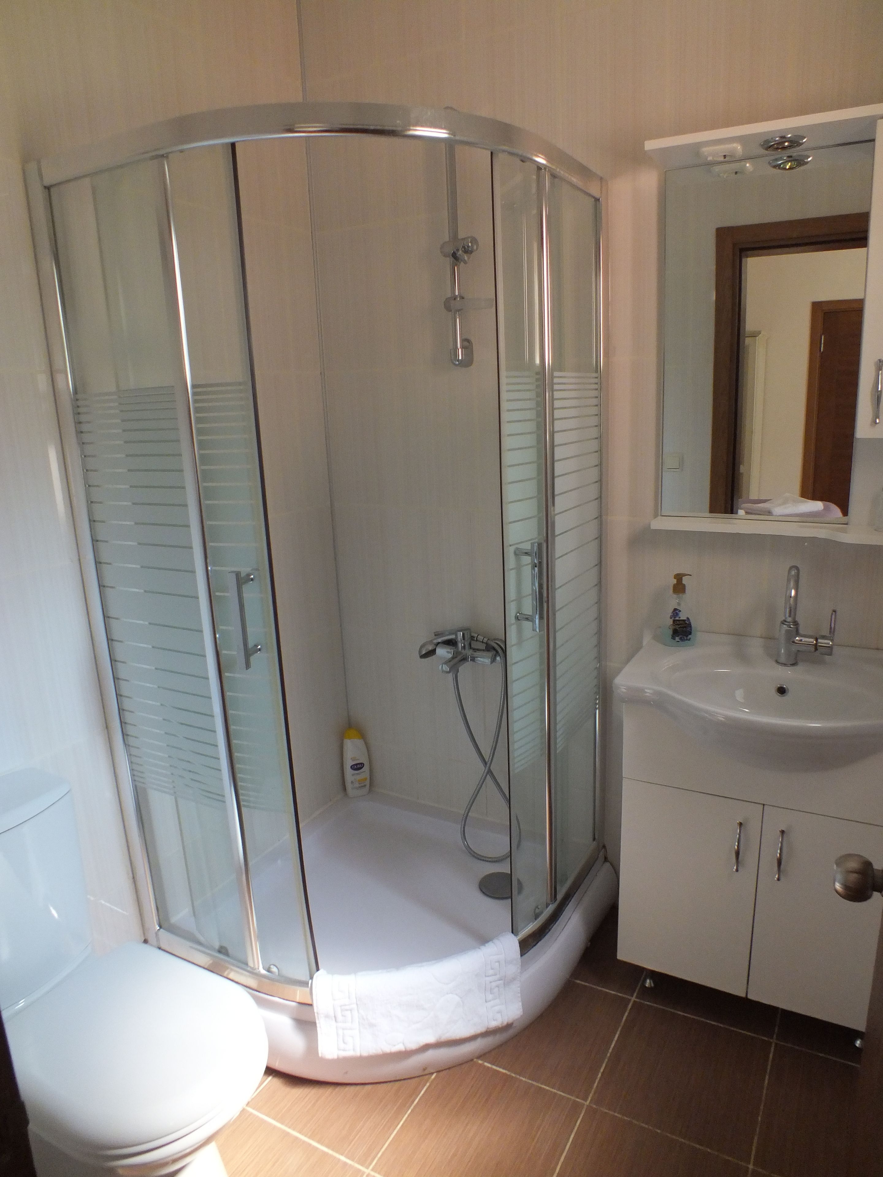 superior double room | bathroom | shower, free toiletries, hair dryer, slippers