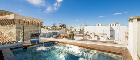 Outdoor pool, pool umbrellas, pool loungers