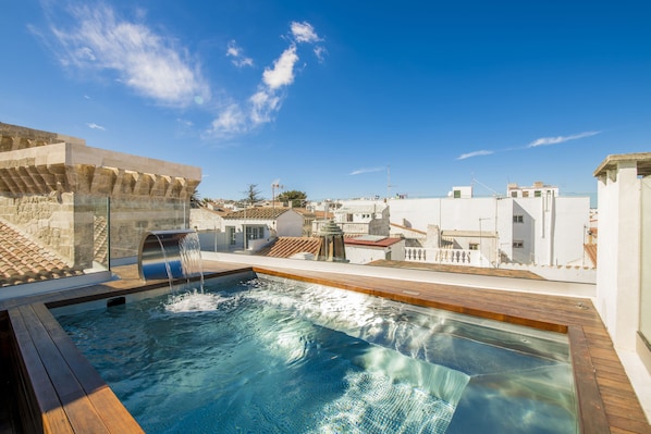 Outdoor pool, pool umbrellas, pool loungers