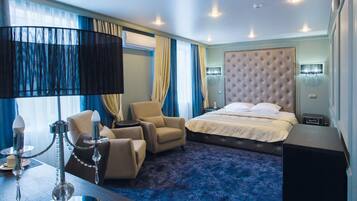 Hypo-allergenic bedding, desk, laptop workspace, blackout curtains