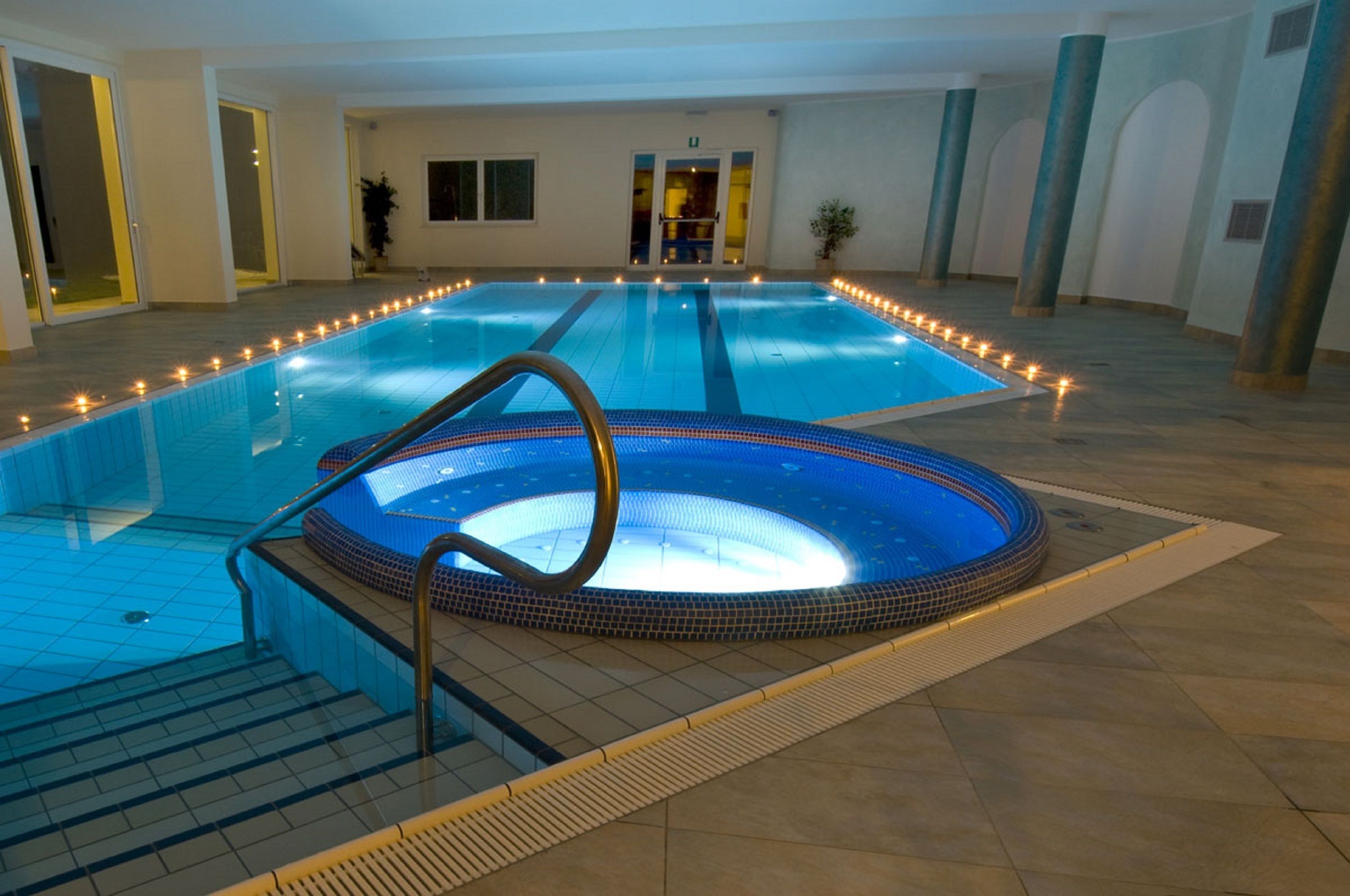 indoor pool, outdoor pool, pool loungers