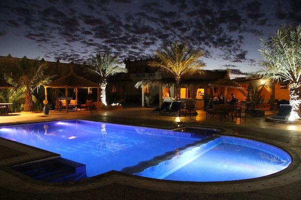 Outdoor pool, pool umbrellas, pool loungers