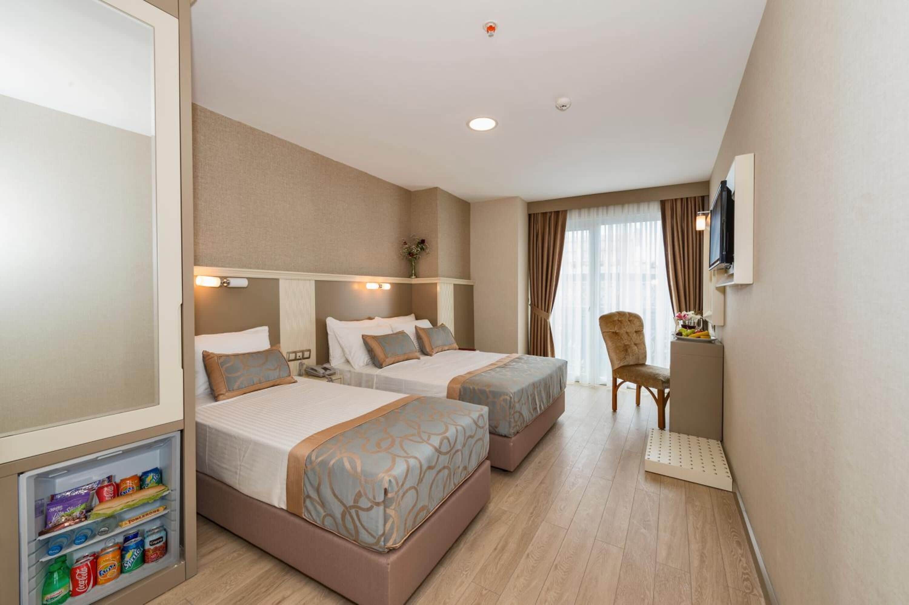 Ropa de cama de alta calidad y minibar 