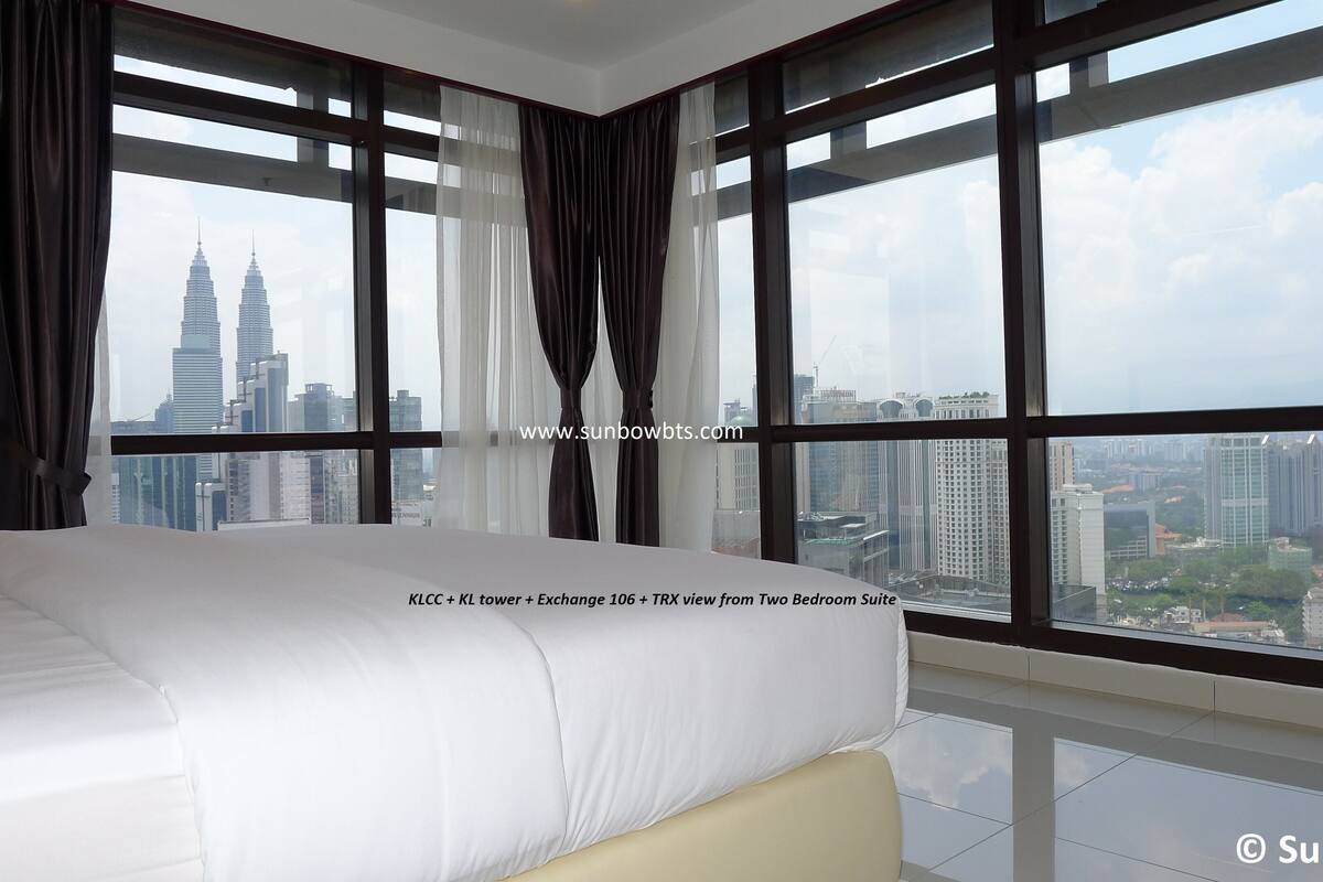 Premium bedding, pillow-top beds, minibar, laptop workspace