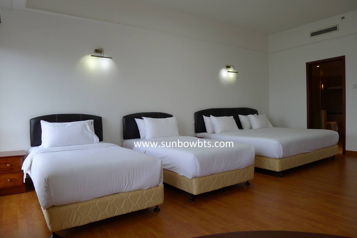 Premium bedding, pillow-top beds, minibar, laptop workspace