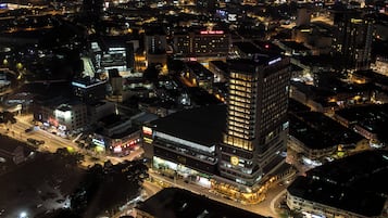 Premium bedding, pillow-top beds, minibar, laptop workspace
