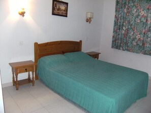 Apartamento família, 2 quartos, acesso à piscina, vista para o jardim