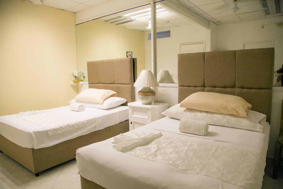 Premium bedding, Select Comfort beds, desk, laptop workspace