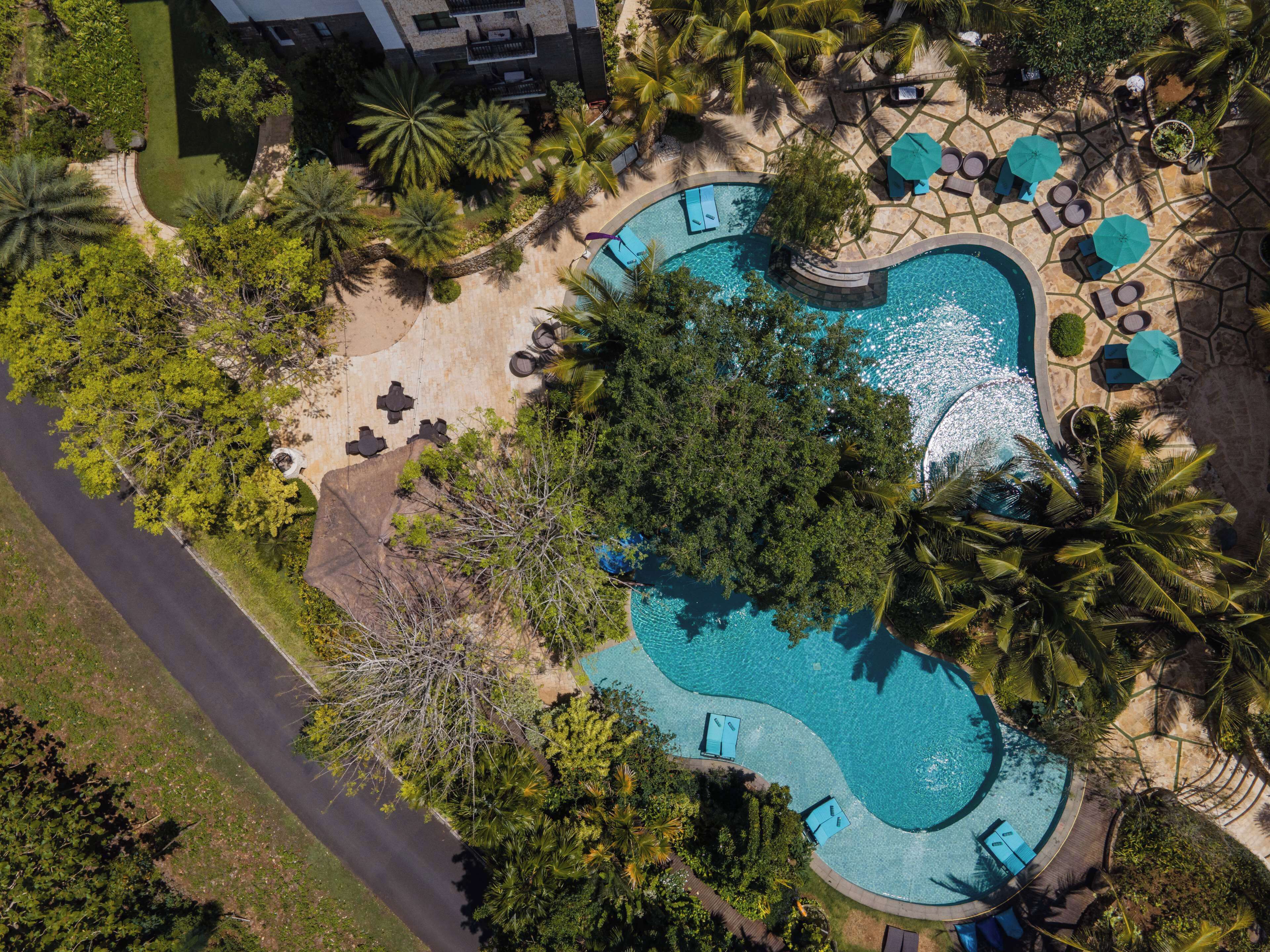 outdoor pool, open 7 am to 9 pm, pool umbrellas, pool loungers