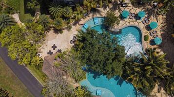 Outdoor pool, open 7 AM to 9 PM, pool umbrellas, pool loungers