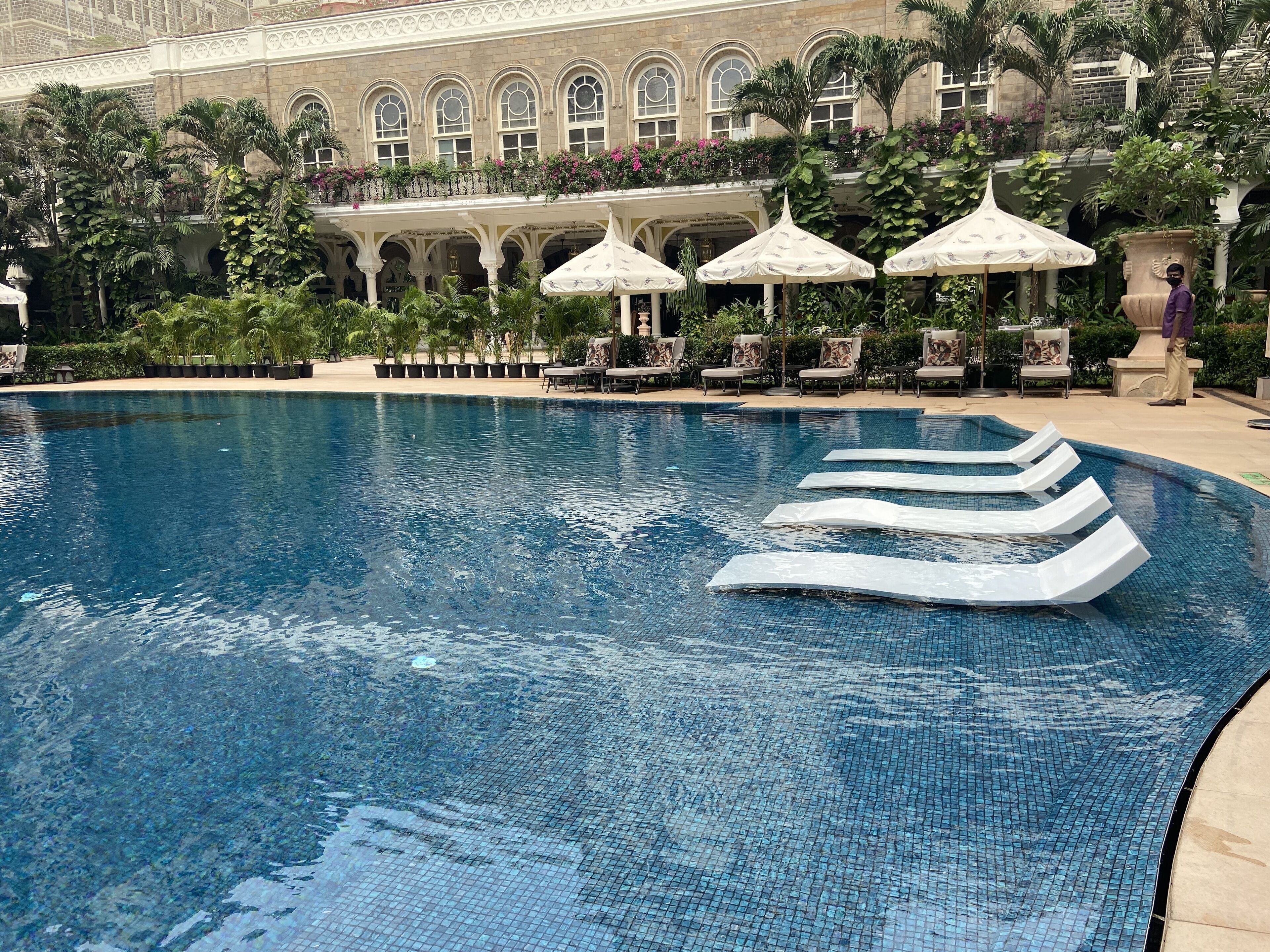 outdoor pool, pool umbrellas, pool loungers