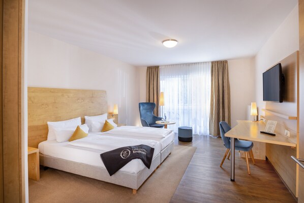 Hypo-allergenic bedding, in-room safe, desk, soundproofing