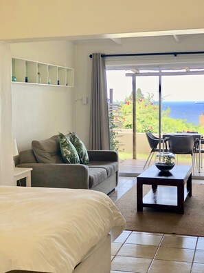 Family Cottage, 1 Bedroom, Sea View | Living area | Flat-screen TV - BeachBreak Cottages (Umhlanga)