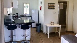 Comfort Cottage, 1 Bedroom, Garden View | Private kitchen | Coffee/tea maker, full-size fridge, microwave, stovetop