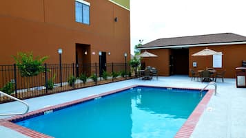 Outdoor pool, pool umbrellas, sun loungers