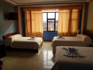 Standard Triple Room, 1 Bedroom, Private Bathroom | Premium bedding, individually decorated, desk, blackout curtains