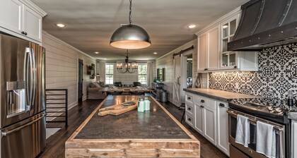 HGTV’s “BARNDOMINIUM” 16 Acres w/ Lake, Outdoor Kitchen, Decks & Playground